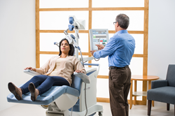 Woman in TMS treatment chair