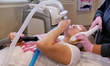 Patient relaxed and comfortable while self-administering ProNox, nitrous oxide (laughing gas) during a procedure.