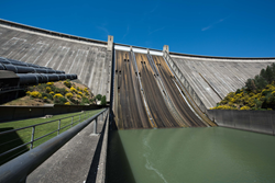 Shasta Dam in California, looking up at it from the river below.