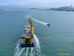 ship arriving in San Francisco Bay with steel float