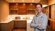 Picture of Bob Sturgeon, President of WestSide Remodeling Design & Build standing in front of a redesigned kitchen