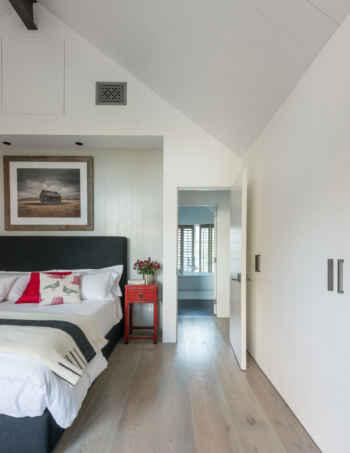 A JLF Architects-designed bedroom photo shared by the New York Times shows a lighter-toned Pacific silver fir wood floor that complements the room’s clean, contemporary feel (photo: Audrey Hall).