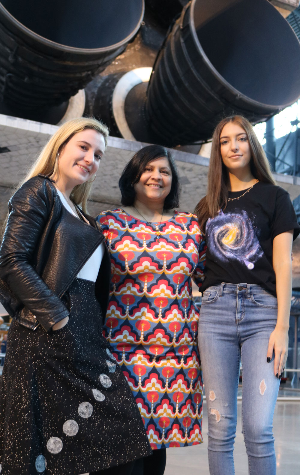 Svaha Founder Jaya Iyer, center, created the company when she couldn’t find her daughter, who is space-obsessed, a single girl’s astronaut shirt or any science or technology-themed clothes for girls.