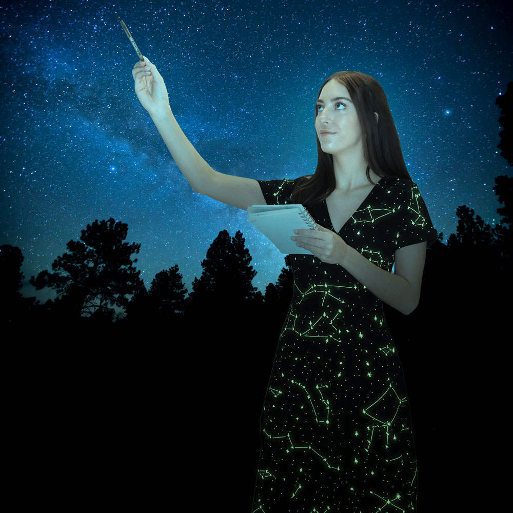 Reach for the stars in this elegant, glowing celestial Katherine dress from Svaha. This dress is an homage to Cartographer of the Universe, Margaret Geller. Available at www.svahausa.com.