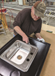 Jonti-Craft employee assembling portable sinks