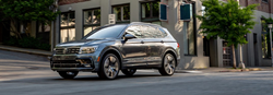 2020 Volkswagen Tiguan front driver side driving on city street
