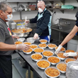 Chef Bruno of Caterina's Club Preparing Pasta Meals for Homeless Children
