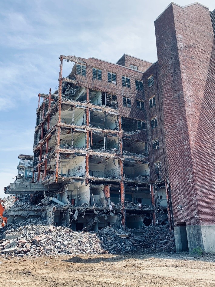 Expert crews are using machines to demolish the Clarence O. Cheney building at the $300 million Hudson Heritage development in the Town of Poughkeepsie, N.Y.