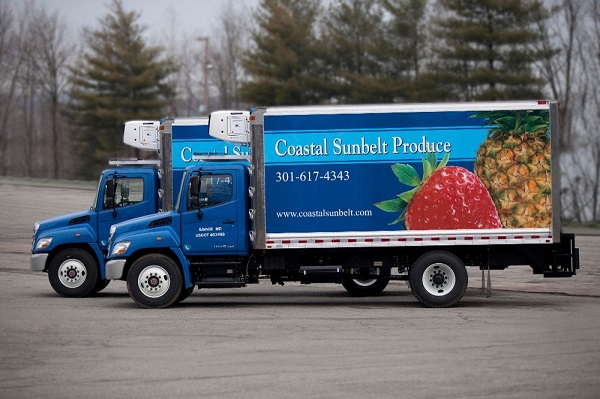 Two of Coastal Sunbelt's vehicles in action.