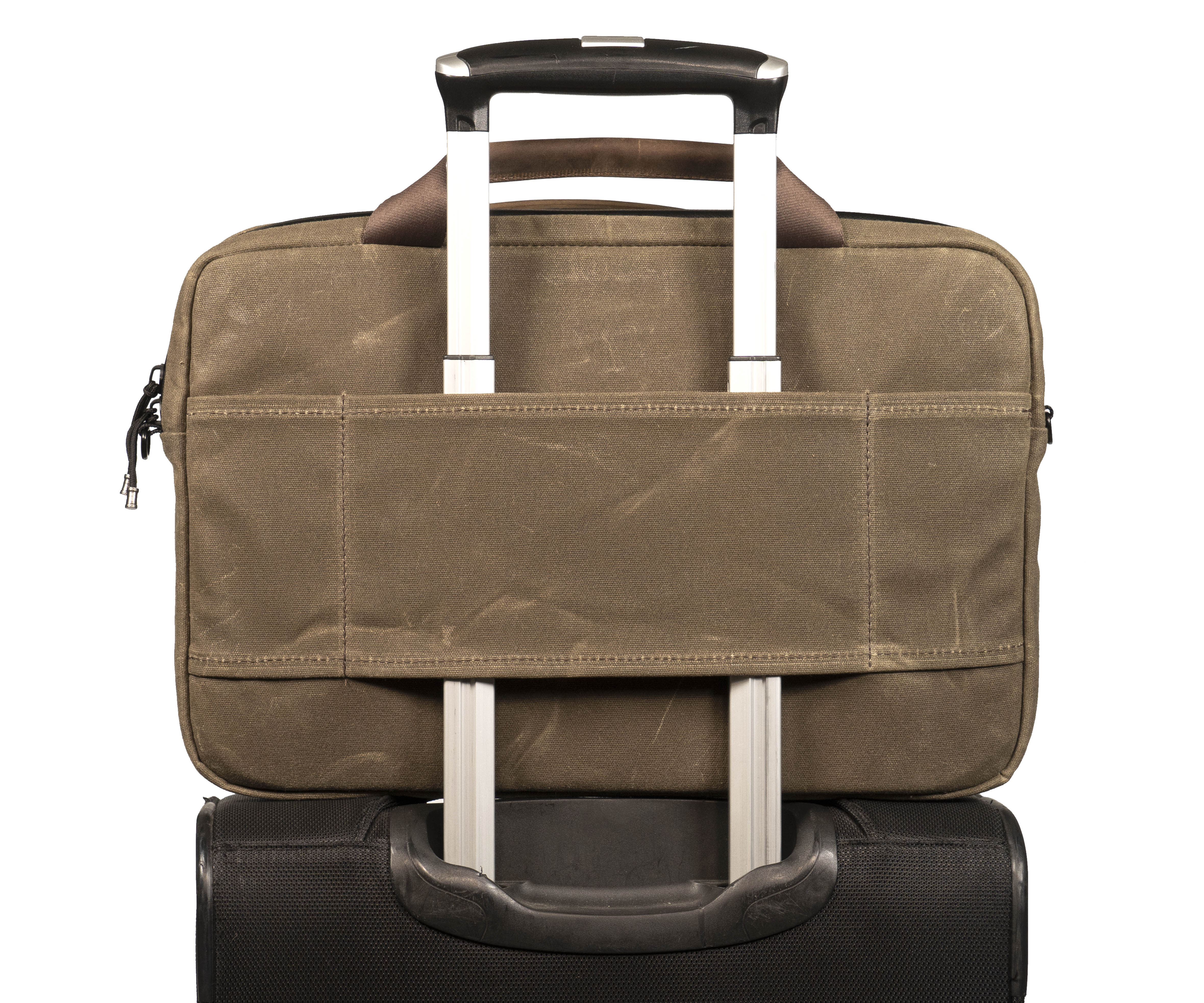 Three carry options: handles, a shoulder strap, and a wheeled suitcase passthrough