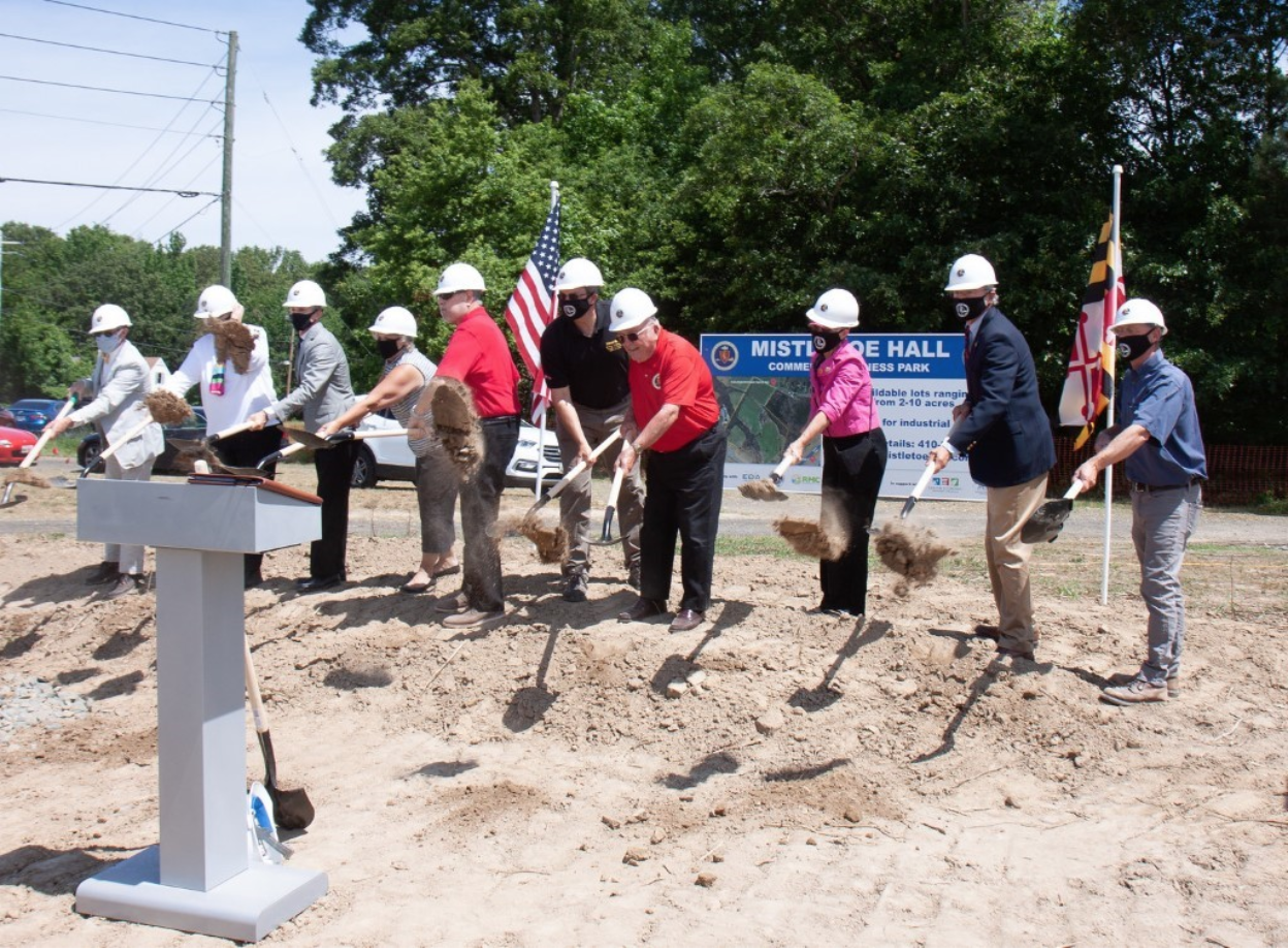 Local, regional, state, and federal officials break ground at the Mistletoe Hall Commerce-Business Park site.