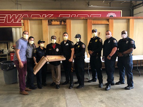 ProudLiving Companies’ meal donation initiative has fed health and public safety workers across Essex County, including members of the Newark Police Department (shown).