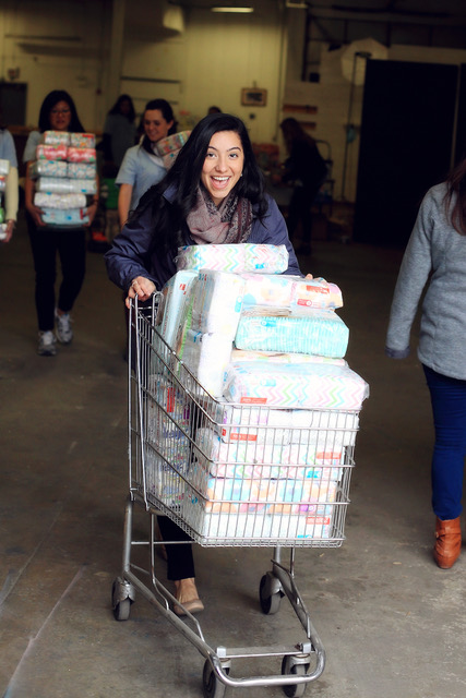 Volunteers collect diapers to donate to Share Our Spare.