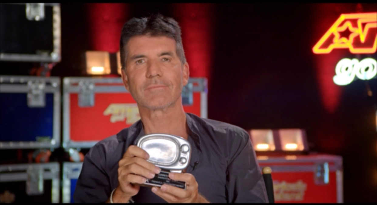 Simon Cowell of AGT accepts his Reality TV Show Award
