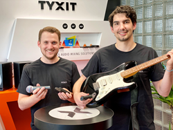TYXIT founders presenting the T.ONE wireless audio devices