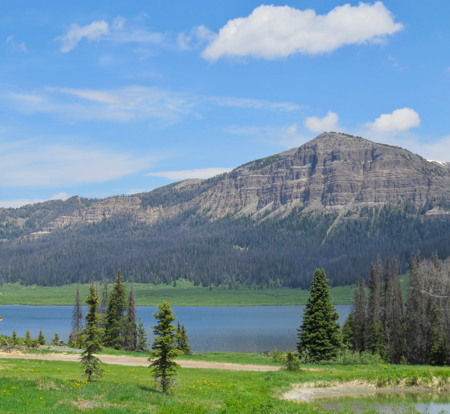 Brooks Lake Lodge sits at 9,200 ft in elevation lakeside deep in Wyoming’s Shoshone National Forest, offering unlimited scenic mountain views.