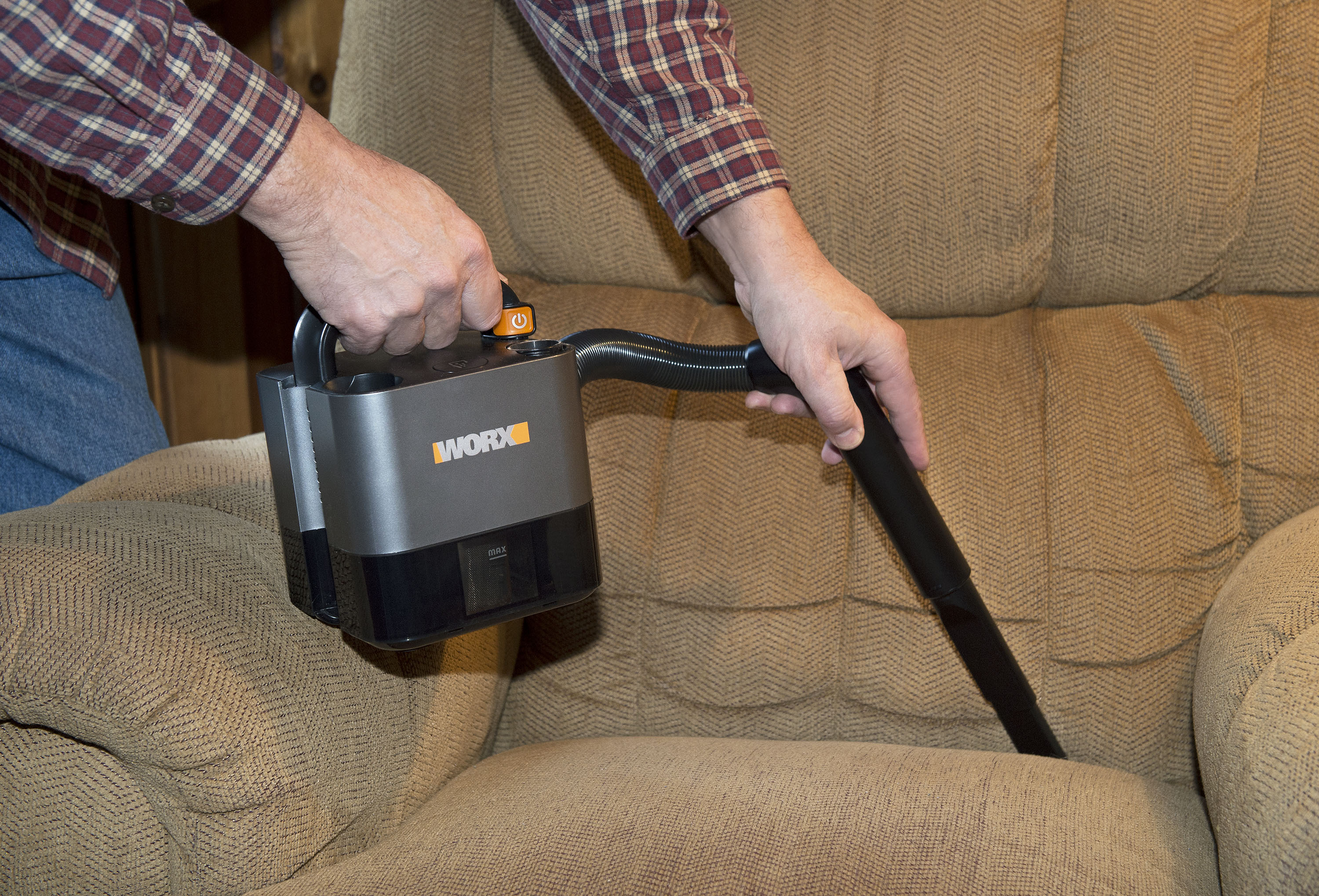 WORX 20V Power Share Portable Vacuum includes a crevice tool for cleaning between chair cushions and other narrow spaces.