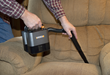 WORX 20V Power Share Portable Vacuum includes a crevice tool for cleaning between chair cushions and other narrow spaces.