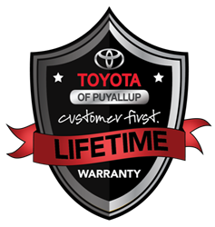 An image of the logo for the Toyota of Puyallup Customer First Lifetime Warranty badge.