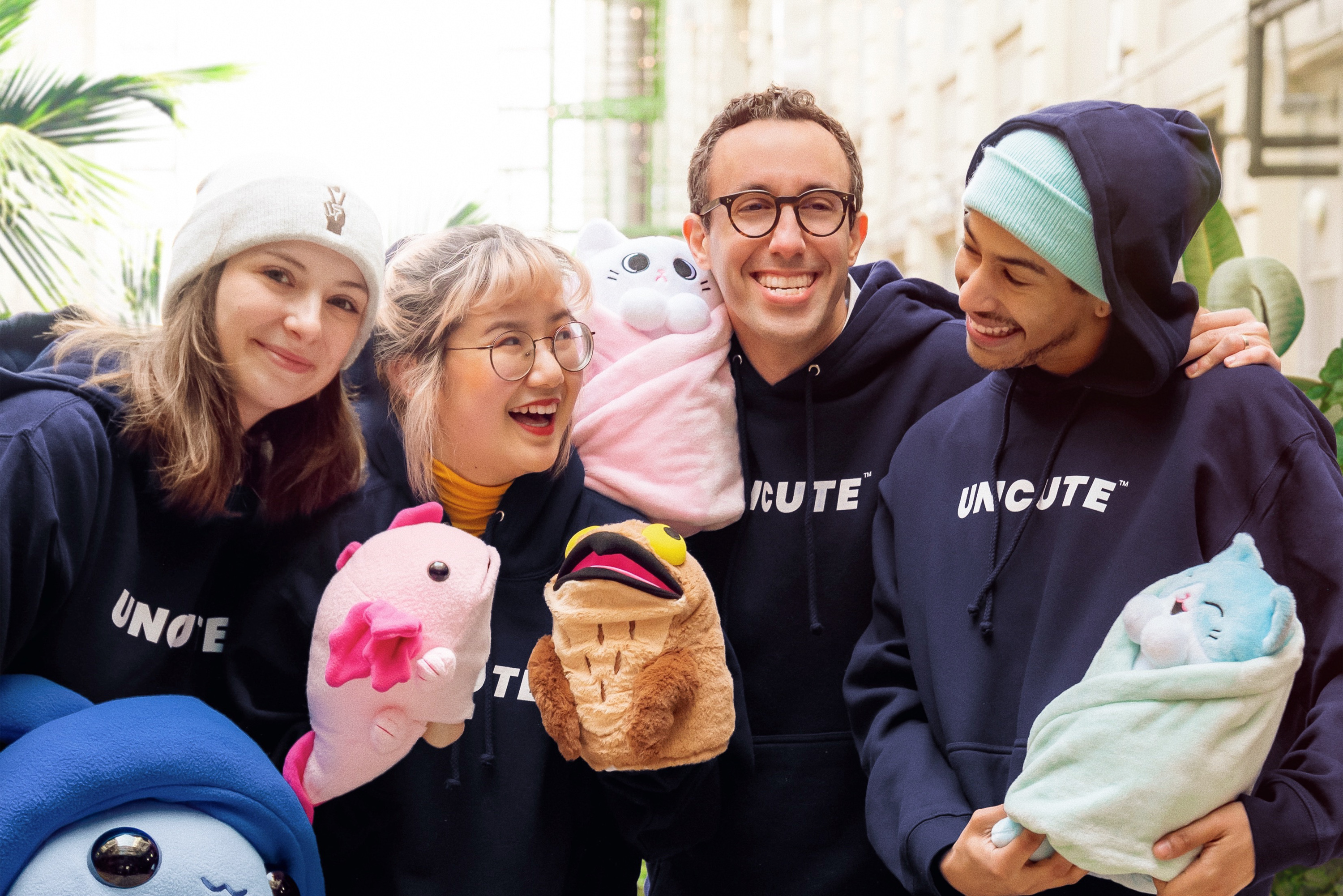 Uncute Initiative volunteers, with co-founder Zack Buchman, and artist Sarula Bau