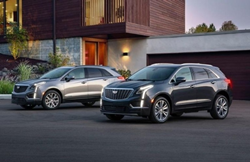 Exterior view of two 2020 Cadillac SUV models