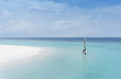 Overwater Yoga at Anantara Kihavah Maldives Villas