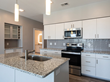 Helix Apartments Kitchen Interior - Summit Pointe in Chesapeake, VA - Property Management by Drucker + Falk