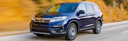 Blue 2021 Honda Pilot on a Country Road