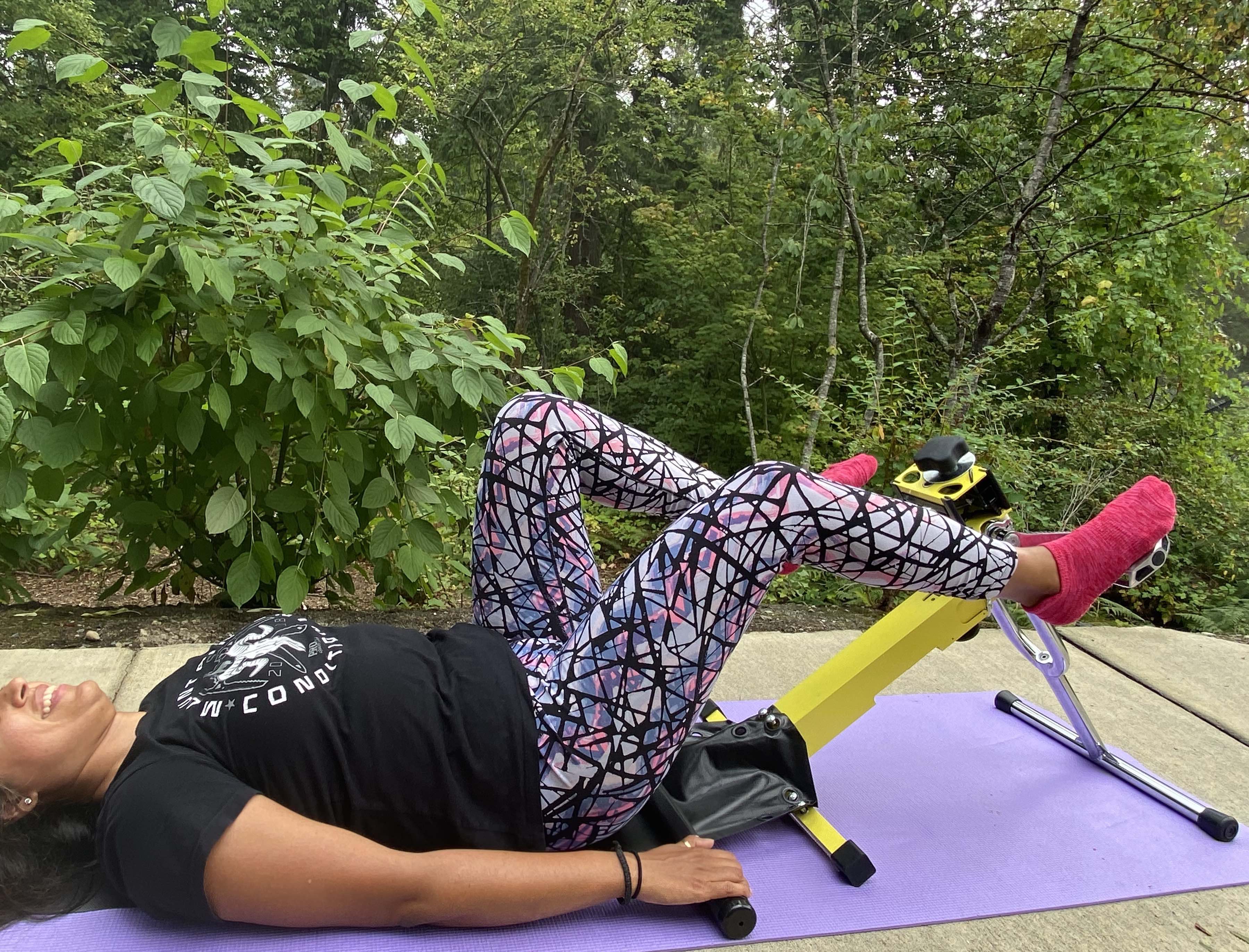 Pedal lying flat on your back while engaging your core