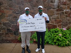 Ideal VP Jay Hall (r) returned to his Minneapolis roots to support the recent “Be The Change” golf tournament. Hall presented a $1,000 check to tourney co-director & life-long friend John Baker, (l).