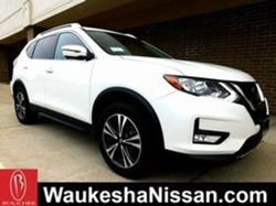 Image of a white pre-owned Nissan vehicle in the Boucher Nissan of Waukesha inventory