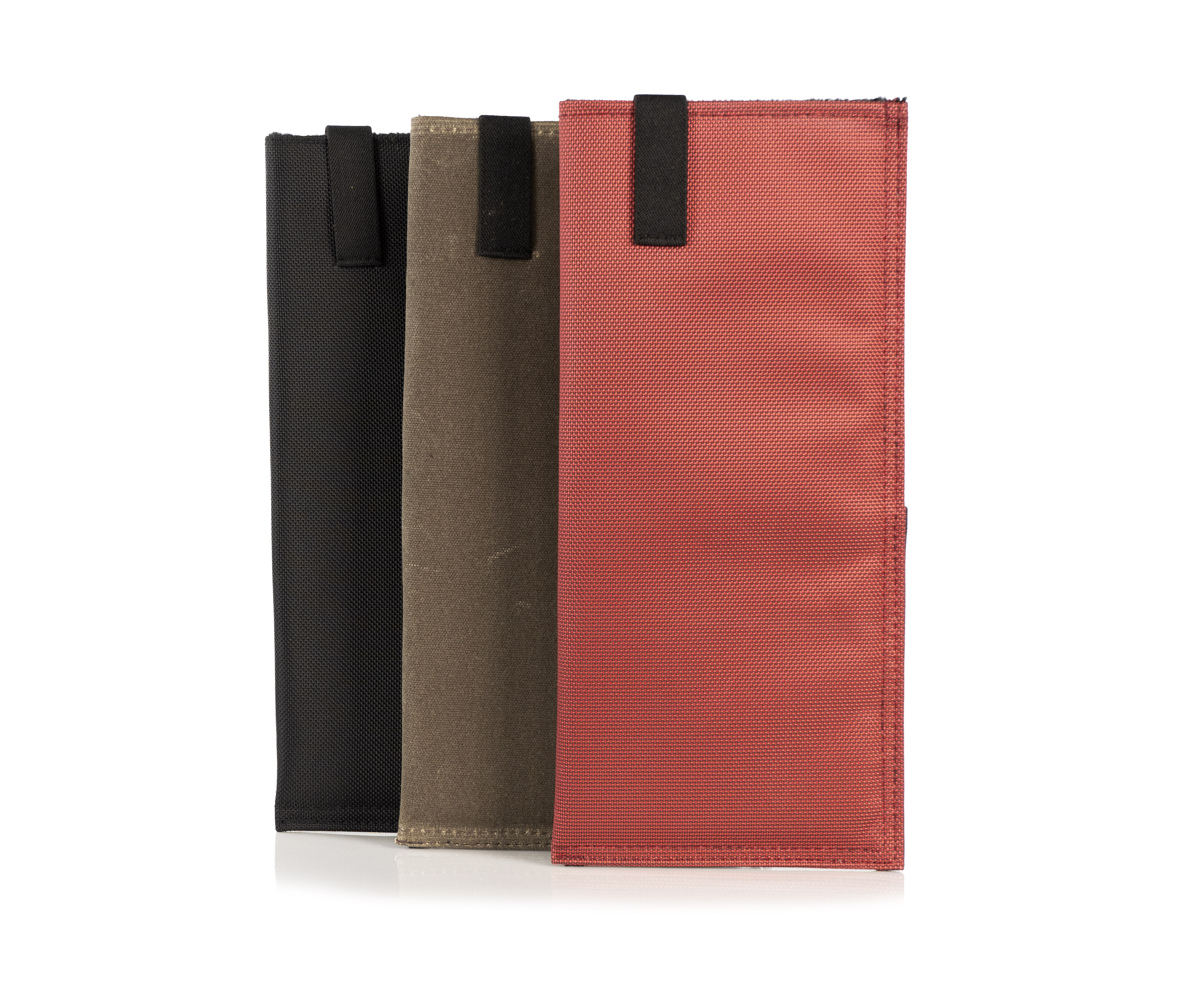 Three material options u2014  ballistic nylon, waxed canvas, and Italian Forza fabric