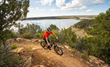 Man riding bike trail over McPhee Reservoir