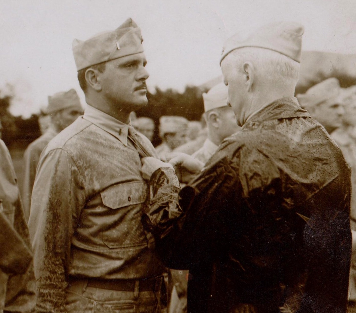 Lt. Frank Tachovsky ("Ski") received the Silver Star Medal from the President of the United States (which was presented by Admiral Chester Nimitz, as seen in this photo).