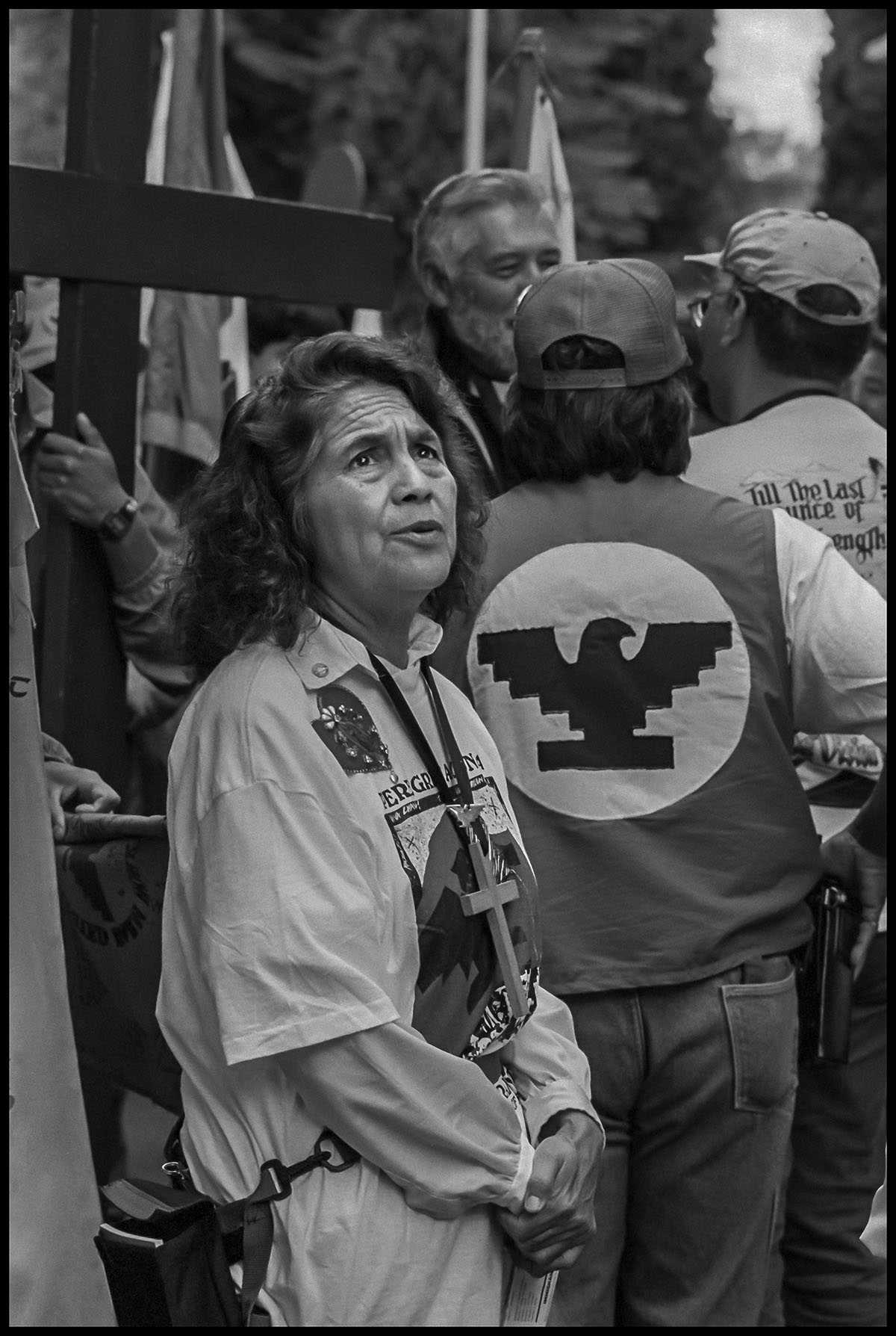 A tired Dolores Huerta in Sacramento, as the march reaches its end after a month. 1994. The David Bacon Archive, Department of Special Collections, Stanford Libraries.