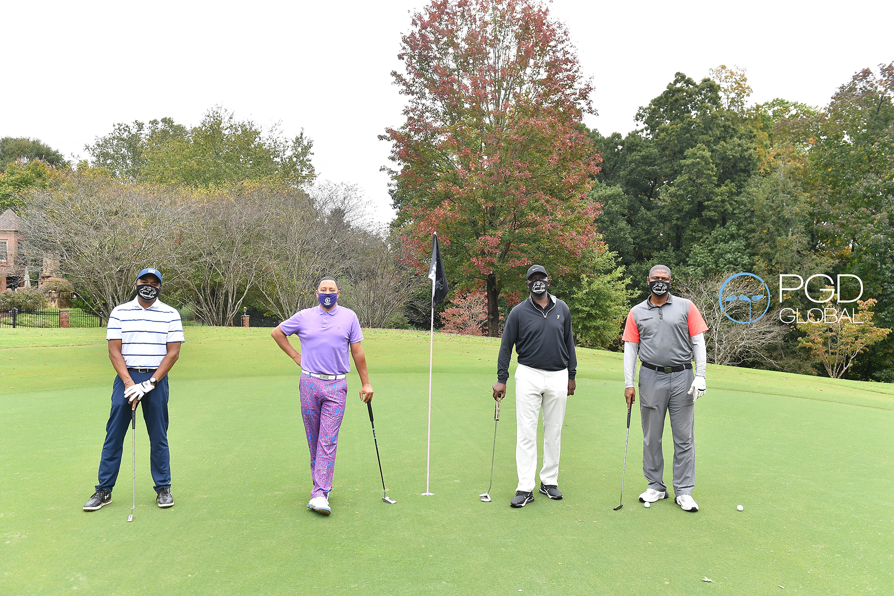 The INDOGGO Gin Pairing: Eric Holifield, Keenan Towns, Mike Phillips and Kainon Jasper pose for a social distanced golf photo at the 2020 Calvin Peete Awards & Golf Tournament.
