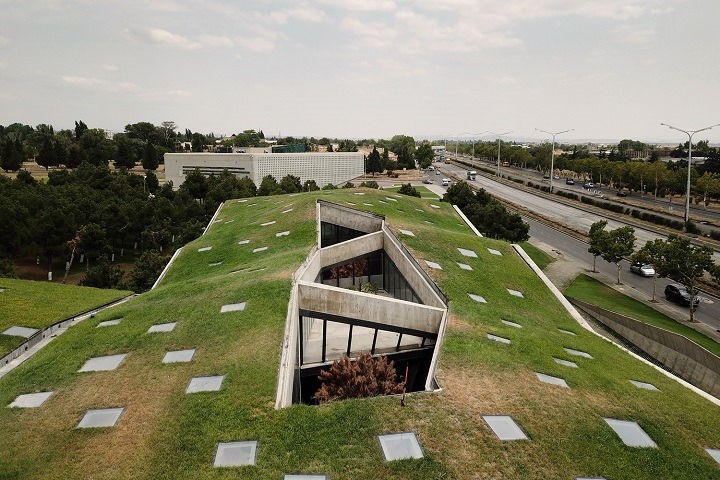 Award-winning design: The striking geometric contours and bold green roof of the MEAMA Coffee Factory in Tbilisi, Georgia keeps the building cooler in summer and warmer in winter.
