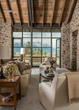 JLF Architects’ modern floor-to-ceiling glass and steel window wall highlights indoor-outdoor Western lifestyle while rustic stone and timber connect to regional sense of place (photo by Audrey Hall).