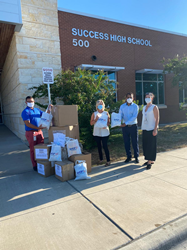 Shop LC donating face masks and hand sanitizer to Round Rock Independent School District.