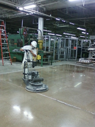 A Painters USA workers undertakes a flooring maintenance program