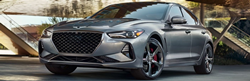 Gray 2021 Genesis G70 Front Exterior in a Driveway