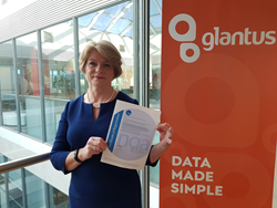 Paula Nolan, Chief Compliance Officer accepts ISO 27701 certificate on behalf of Glantus