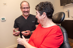 Dentist, Dr. Robert Leedy and a Dental Implant Patient in Abilene, TX