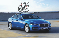 2020 Jaguar XE with a bike on top of it