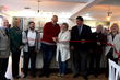 Owners Michael and Sherry Marion cut the ribbon to open their Open Doors Coffee House.