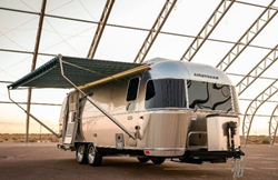 A metallic 2021 Airstream international 25FB, which can be found at Airstream of Scottsdale.