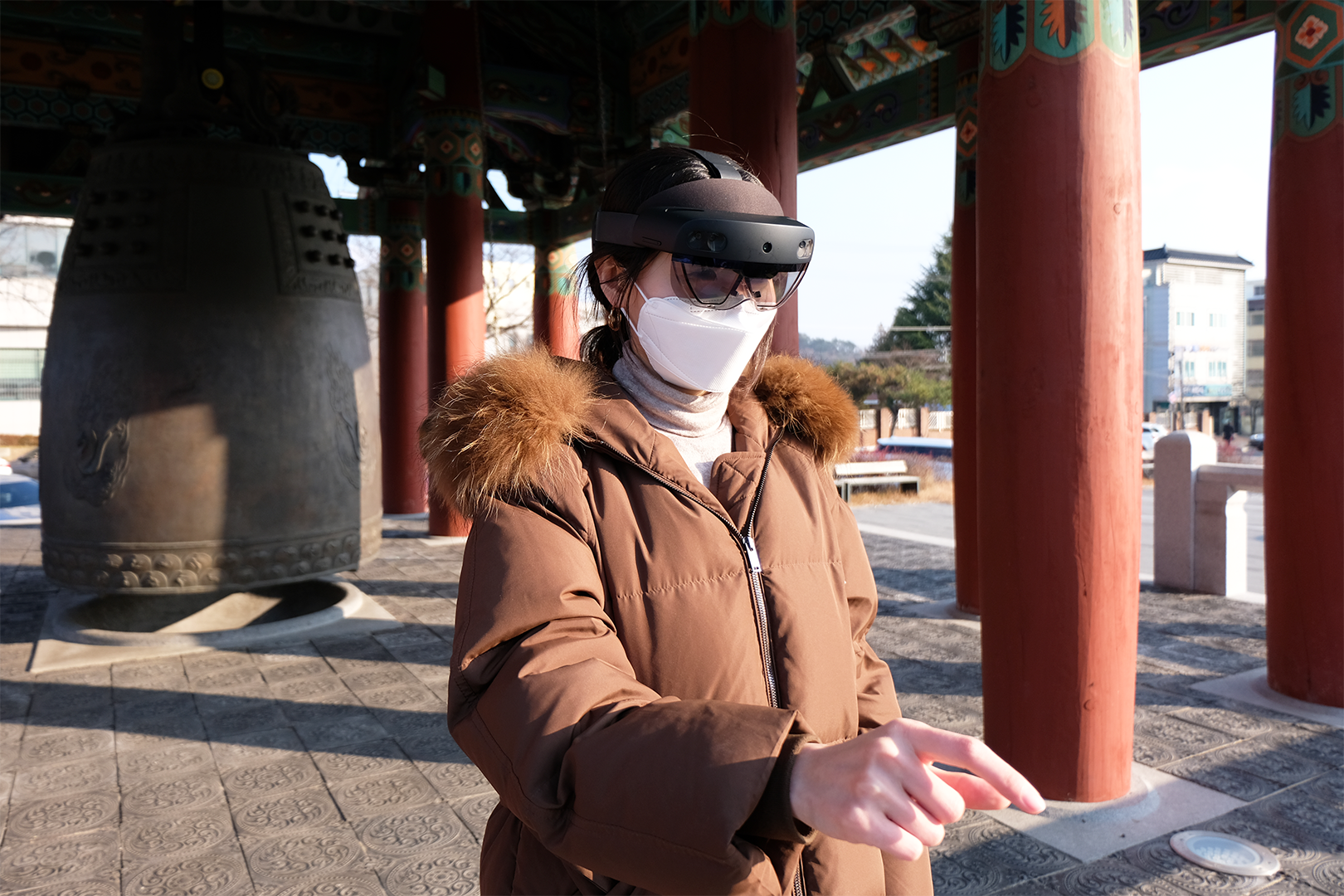 DoubleMe team member demonstrates the TwinWorld's use outdoors while wearing the HoloLens 2 headset.