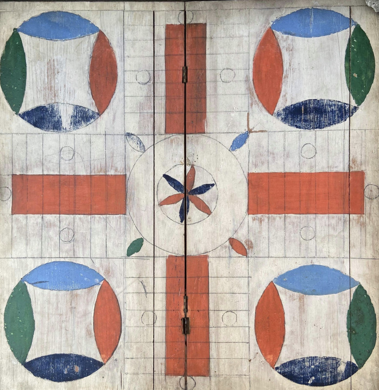 Most Pleasing Folding Parcheesi Board. c. 1880. Paint and surface are original. The colors and spareness of the graphics make this a very attractive board.