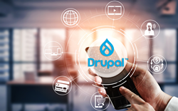 A pair of hands holds a mobile device. It is overlaid with the Drupal logo in blue.