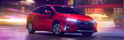 2021 Toyota Prius Prime red side view at night
